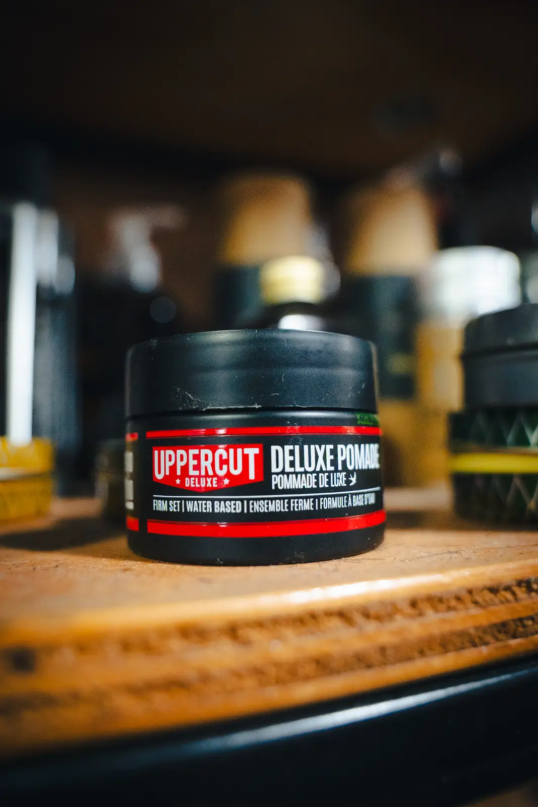 Pomada Uppercut Deluxe en el mesón de Club34 Barbería